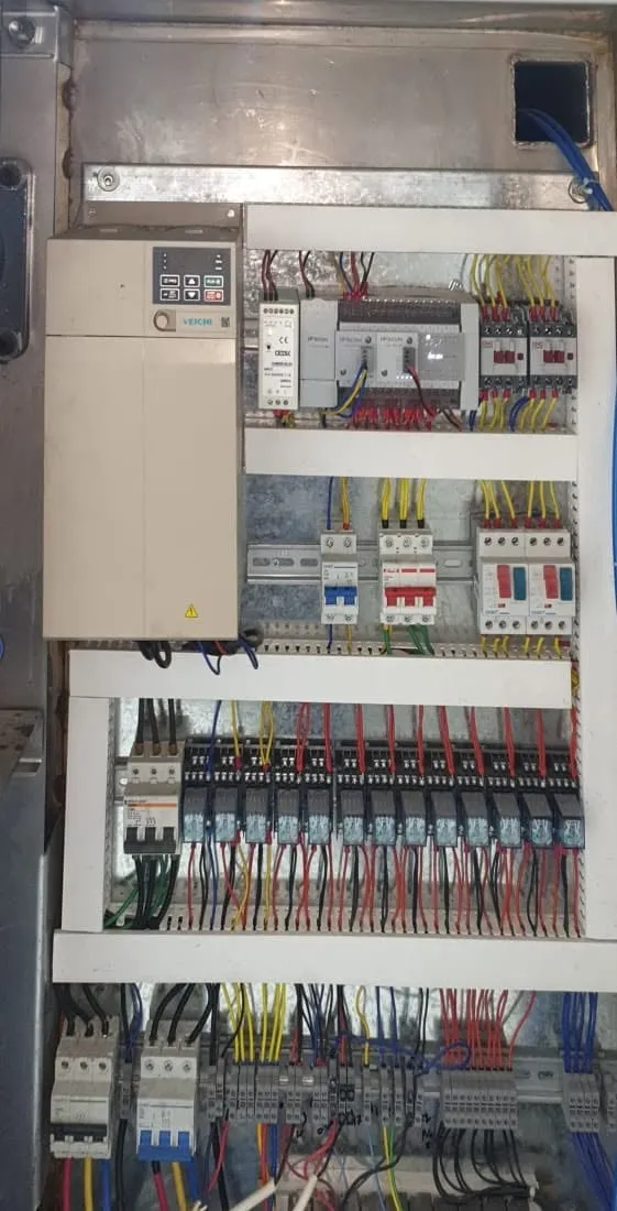 Cheese cooker control panel with a VEICHI drive, Wecon PLC and expansion module, circuit breakers and relays
