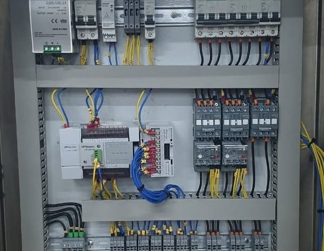 Milk pasteurizer control panel with a Wecon PLC and expansion module, power supply, circuit breakers, contactors and overload relays