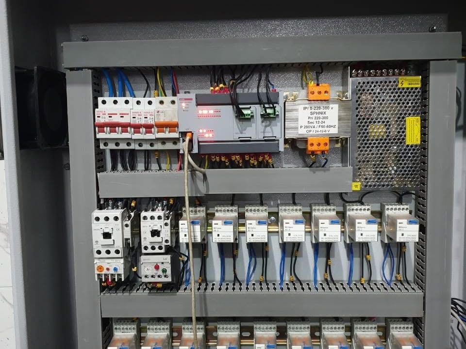 Autoclave control panel with an LS PLC and expansion module, control transformer, power supply, contactors and relays