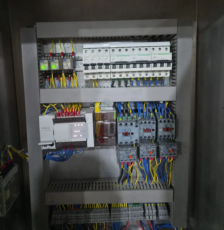 Pasteurizer control panel with Wecon PLC, Schneider Electric circuit breakers, relays, contactors and overload relays